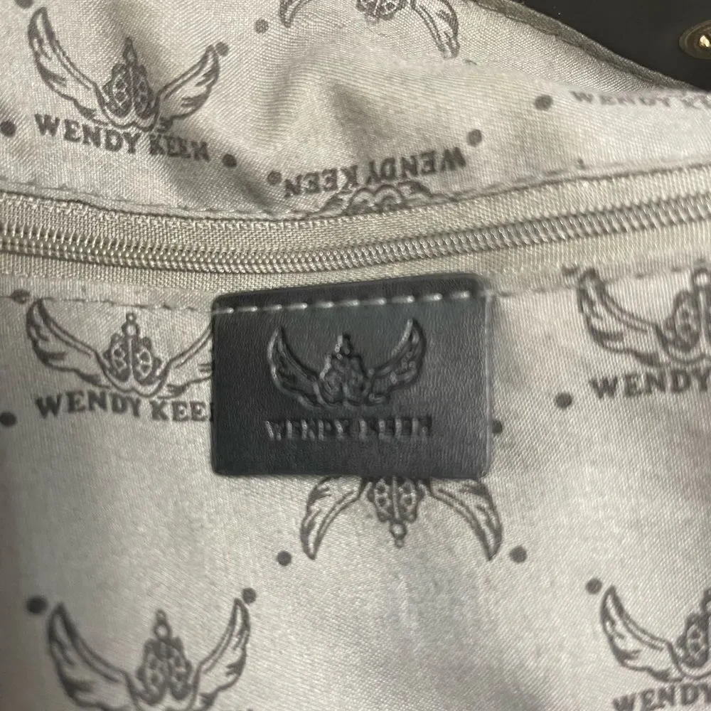Wendy Keen Synthetic black and gray logo Backpack drawstring top closure.